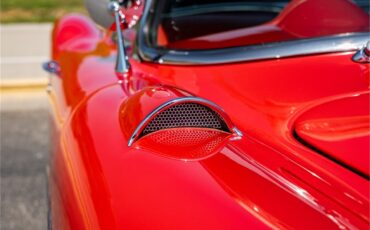 Chevrolet-Corvette-1957-Venetian-Red-Polo-White-Red-27