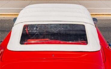 Chevrolet-Corvette-1957-Venetian-Red-Polo-White-Red-54