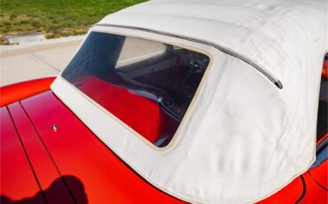 Chevrolet-Corvette-1957-Venetian-Red-Polo-White-Red-55