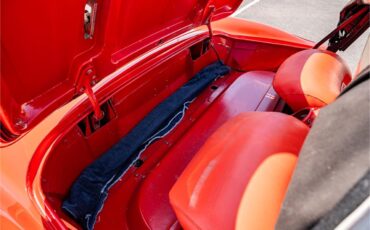 Chevrolet-Corvette-1957-Venetian-Red-Polo-White-Red-57