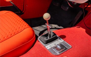 Chevrolet-Corvette-1957-Venetian-Red-Polo-White-Red-79