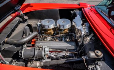 Chevrolet-Corvette-1957-Venetian-Red-Polo-White-Red-96
