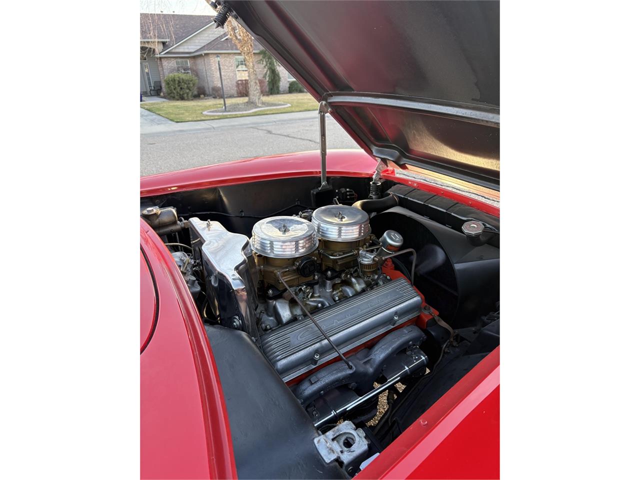 Chevrolet-Corvette-1957-Venetian-Red-Polo-White-Red-98