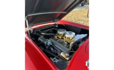 Chevrolet-Corvette-1957-Venetian-Red-Polo-White-Red-99