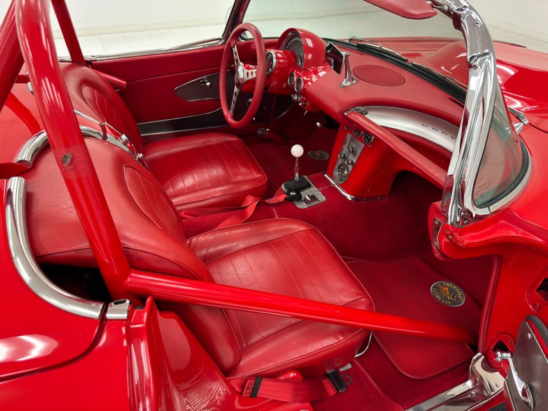 Chevrolet-Corvette-1959-Roman-Red-Red-37