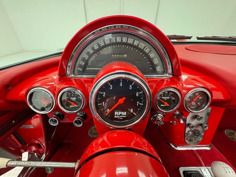 Chevrolet-Corvette-1959-Roman-Red-Red-39