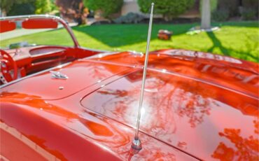 Chevrolet-Corvette-1961-Roman-RedWhite-Red-4