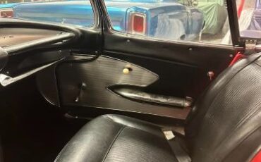 Chevrolet-Corvette-1962-Deep-Red-Jet-Black-5