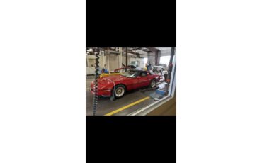 Chevrolet-Corvette-1985-Red-Tan