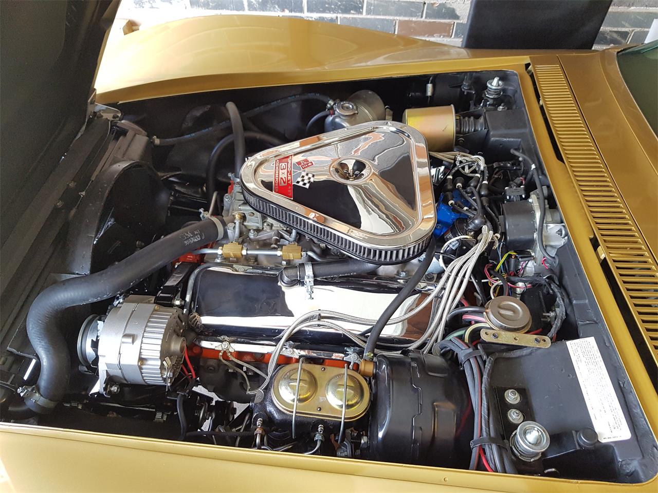 Chevrolet-Corvette-stingray-1969-River-Side-Gold-saddle-19