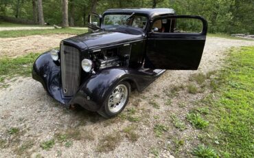 Chevrolet-Coupe-1934-Dark-Purple-Tan-11