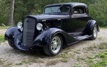 Chevrolet-Coupe-1934-Dark-Purple-Tan