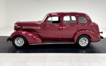 Chevrolet-Master-deluxe-1938-Ruby-Red-Metallic-Gray