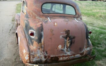 Chevrolet-Master-deluxe-1939-black-tan-3