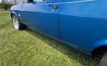 Chevrolet-Nova-1973-Medium-blue-metallic-Gray-and-black-1