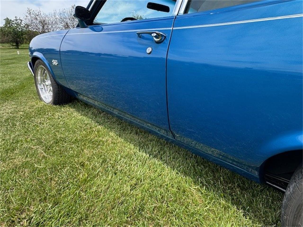 Chevrolet-Nova-1973-Medium-blue-metallic-Gray-and-black-1