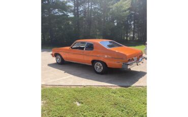 Chevrolet-Nova-1973-Orange-Black