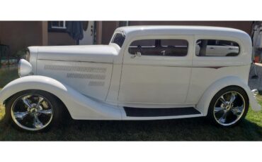 Chevrolet-Sedan-1934-Mercedes-White-2-tone-ld-Purple-8