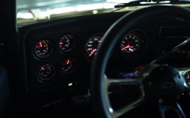 Chevrolet-c10-stepside-1975-black-12