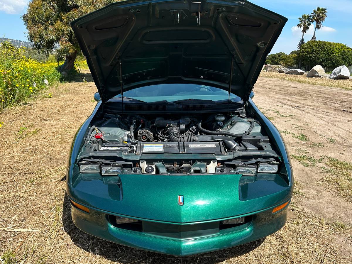 Chevrolet-camaro-sport-coupe-amp-convertible-1995-green-13
