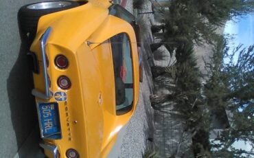 Chevrolet-corvette-stingray-1973-yellow-1