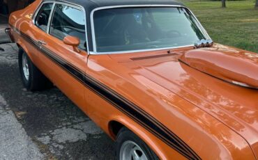 Chevrolet-nova-hatchback-ss-1973-orange-1