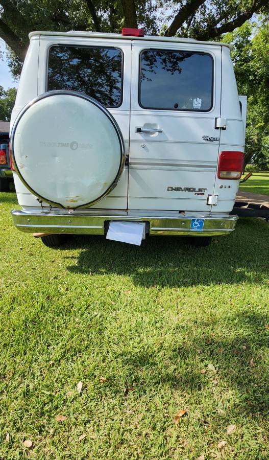 Chevy-conversion-van-1994-white-1