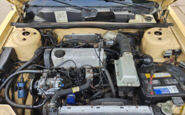 Chrysler-lebaron-1985-yellow-9