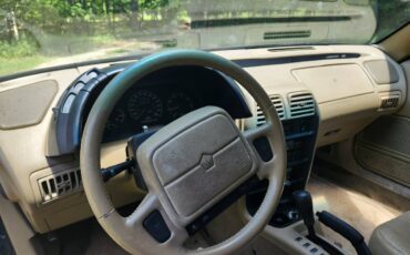 Chrysler-lebaron-gtc-1995-green-4