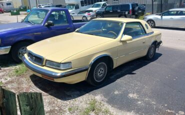 Chrysler-lebaron-tc-maserati-1989-yellow-1