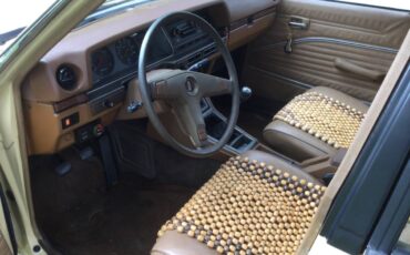 Datsun-510-1980-yellow-15