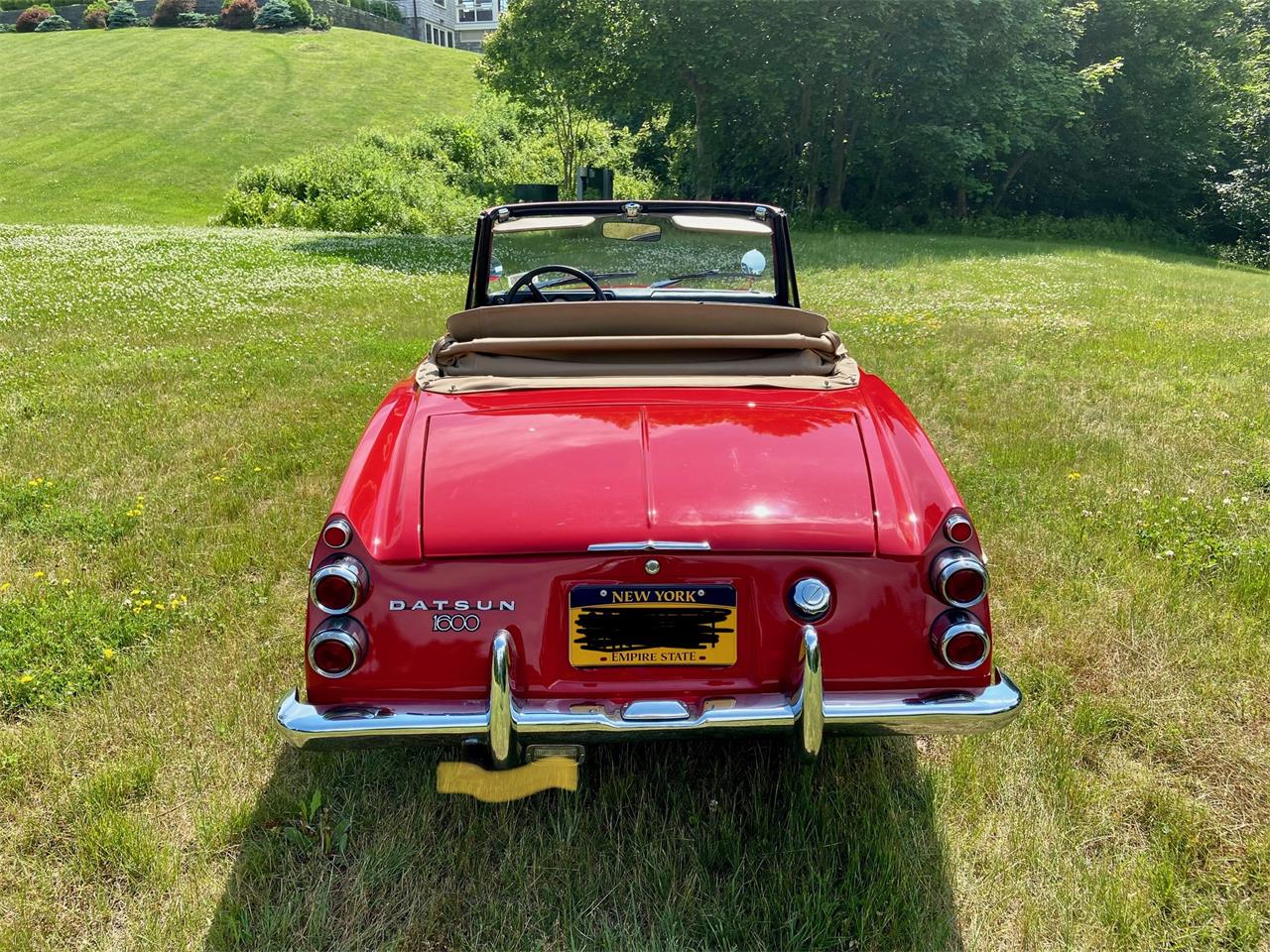Datsun-Roadster-1968-Red-Tan-11