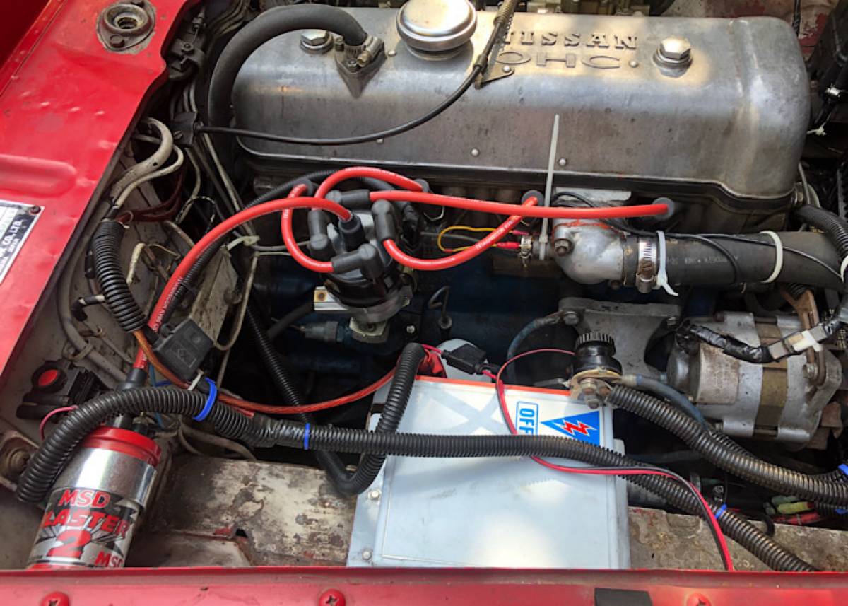 Datsun-sports-2000-roadster-comp-upgrades-1968-red-18