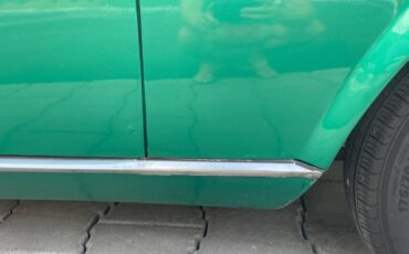 Fiat-124-spider-1977-green-15