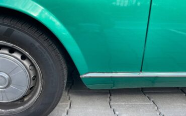 Fiat-124-spider-1977-green-17