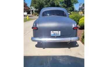 Ford-Coupe-1949-Primer-Red-and-Black-10