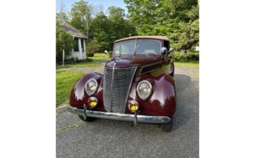Ford-Deluxe-1937-Bright-Coach-Maroon-Tan