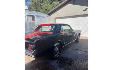 Ford-Mustang-1965-Black-with-red-strip-Red-leather-1