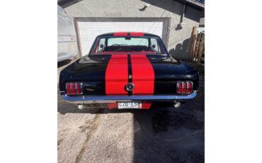 Ford-Mustang-1965-Black-with-red-strip-Red-leather-4