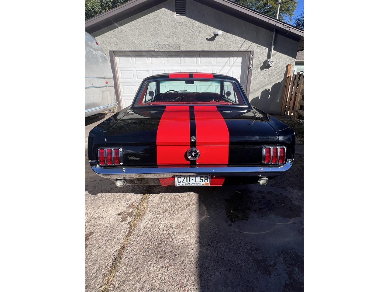 Ford-Mustang-1965-Black-with-red-strip-Red-leather-4