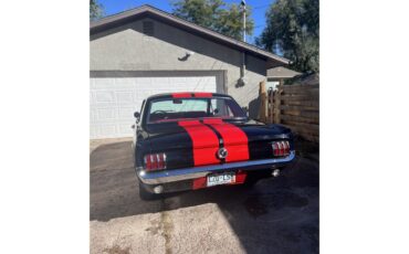 Ford-Mustang-1965-Black-with-red-strip-Red-leather-5