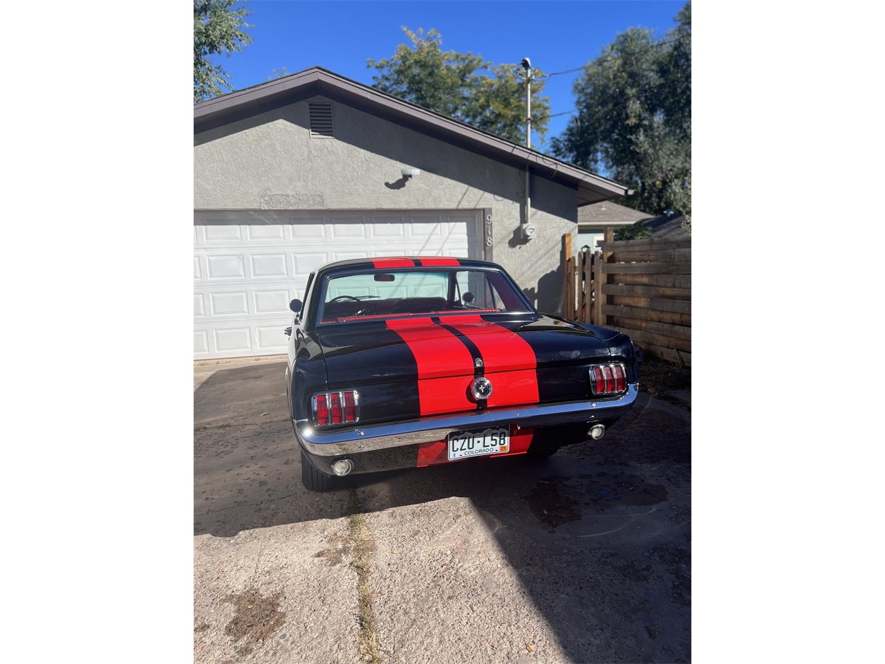 Ford-Mustang-1965-Black-with-red-strip-Red-leather-5