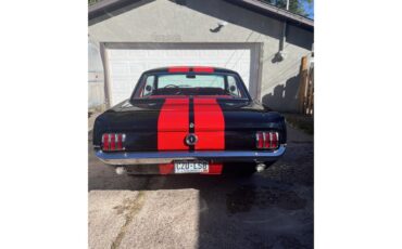 Ford-Mustang-1965-Black-with-red-strip-Red-leather-6
