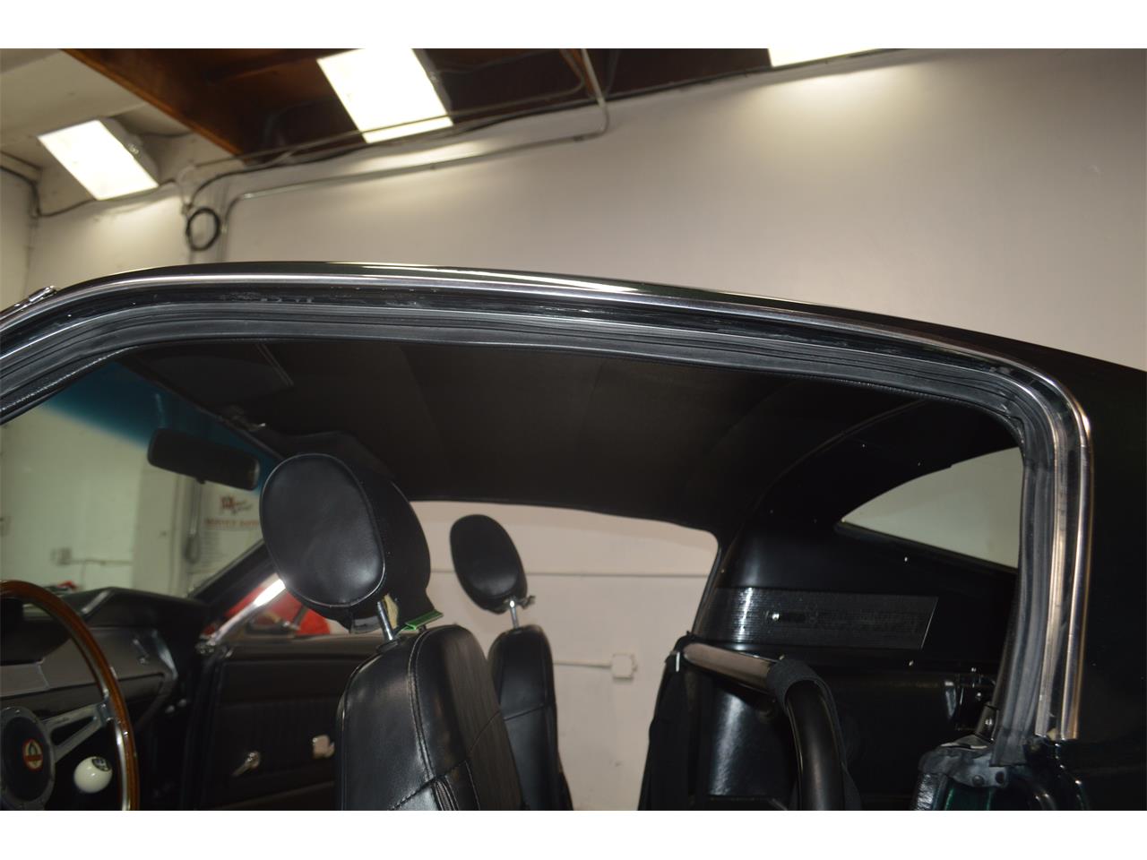 Ford-Mustang-1968-METALIC-GREEN-BLACKRED-STICHING-39