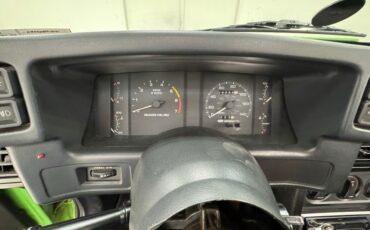 Ford-Mustang-1987-Gotta-Have-It-Green-Black-36