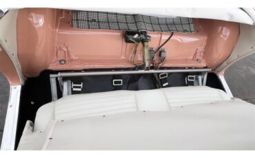 Ford-Thunderbird-1957-Coral-Sand-White-23