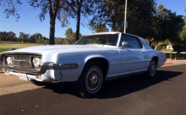 Ford-Thunderbird-1969-Diamond-Blue-Nugget-Gold
