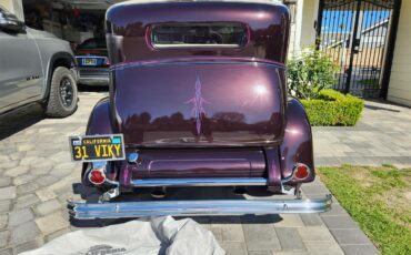 Ford-Victoria-1931-Burgundy-Tan-5