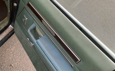 Ford-country-squire-1980-green-11