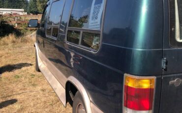 Ford-e150-conversion-van-1994-green